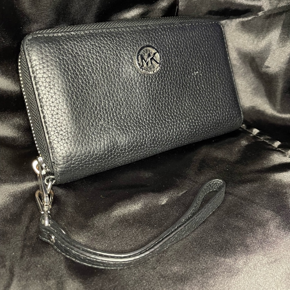 Michael Kors black wristlet wallet. Used.